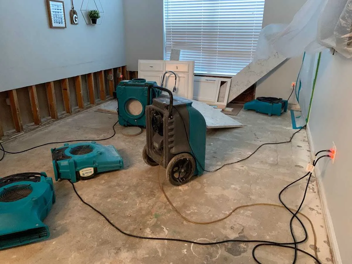 Dehumidifier in flood-cut room for Water Damage Restoration in Franklin Lakes